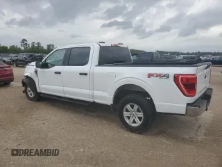 2022 Ford F-150 XL with VIN 1FTFW1E82NFA51713, listed as a Copart auction lot 54581755 with 69,966 mi miles and Salvage Title. Bid and sale history available at DreamBid. Image 2.