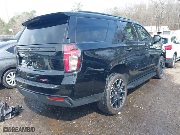 2023 Chevrolet Tahoe RST with VIN 1GNSCRKD7PR225100, listed as a IAAI auction lot 41758562 with 34,393 mi miles. Bid and sale history available at carsss.com. Image 4.