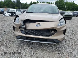 2020 Ford Escape S with VIN 1FMCU0F66LUB57604, listed as a Copart auction lot 58354665 with 58,871 mi miles and Salvage title. Bid and sale history available at DreamBid. Image 5.