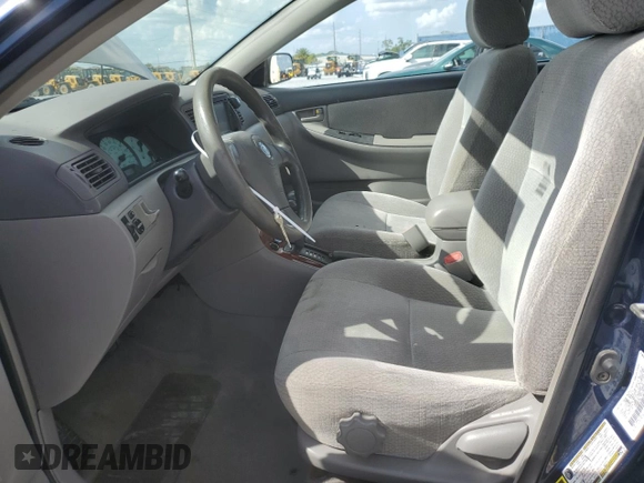 2004 Toyota Corolla CE with VIN 1NXBR38E74Z335430, listed as a Copart auction lot 51757685 with 299,999 mi miles and Salvage Title. Bid and sale history available at DreamBid. Image 7.