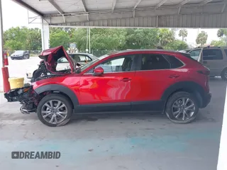 2023 Mazda CX-30 S Carbon Edition with VIN 3MVDMBCM3PM537841, listed as a IAAI auction lot 42080487 with 22,718 mi miles and . Bid and sale history available at DreamBid. Image 15.