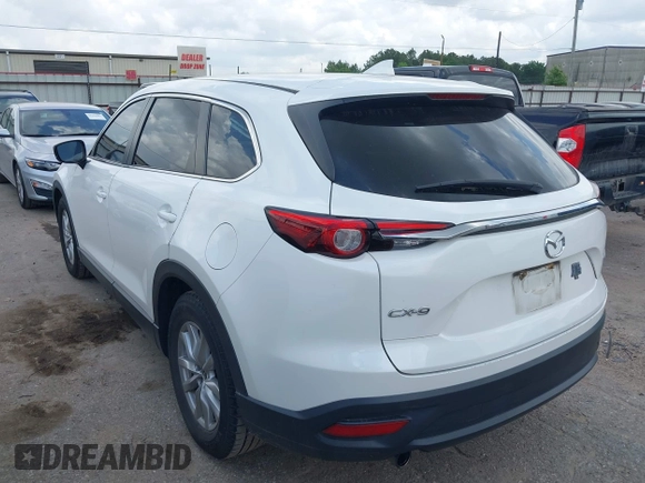 2016 Mazda CX-9 Sport z VIN JM3TCABY1G0111316, wystawiony jako IAAI lot #42085945 z przebiegiem 98 691 mil mil oraz . Historia ofert i sprzedaży dostępna na DreamBid. Obrazek 3.