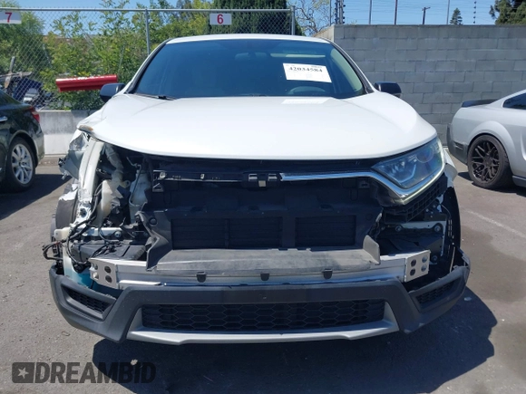 2019 Honda CR-V LX with VIN 2HKRW5H33KH407463, listed as a IAAI auction lot 42034584 with 85,454 mi miles and . Bid and sale history available at DreamBid. Image 13.