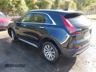 2021 Cadillac XT4 FWD Premium Luxury with VIN 1GYFZCR43MF052422, listed as a IAAI auction lot 41985859 with 25,112 mi miles. Bid and sale history available at carsss.com. Image 3.