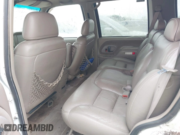 1997 GMC Yukon with VIN 1GKEK13R2VJ739795, listed as a IAAI auction lot 42011678 with 185,306 mi miles. Bid and sale history available at carsss.com. Image 8.