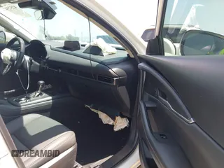 2021 Mazda CX-30 Select with VIN 3MVDMBBL9MM313039, listed as a IAAI auction lot 42575424 with 21,083 mi miles and . Bid and sale history available at DreamBid. Image 5.