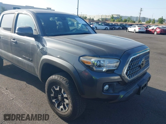 2019 Toyota Tacoma SR with VIN 3TMCZ5AN7KM251625, listed as a IAAI auction lot 42527478 with 45,689 mi miles and . Bid and sale history available at DreamBid. Image 1.