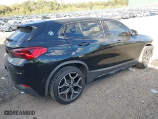 2018 BMW X2 xDrive28i with VIN WBXYJ5C33JEF78378, listed as a IAAI auction lot 40577868 with 45,592 mi miles. Bid and sale history available at carsss.com. Image 4.