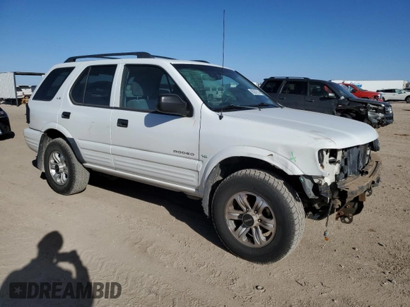 2001 Isuzu Rodeo S z VIN 4S2DM58W114306215, wystawiony jako Copart lot #85287914 z przebiegiem 157 844 mil mil oraz Szkoda całkowita • Salvage title. Historia ofert i sprzedaży dostępna na DreamBid. Obrazek 4.
