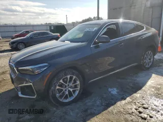 2022 BMW X6 xDrive40i z VIN 5UXCY6C03N9K70765, wystawiony jako Copart lot #42264335 z przebiegiem Nie podano mil oraz Szkoda całkowita • Salvage title. Historia ofert i sprzedaży dostępna na DreamBid. Obrazek 1.