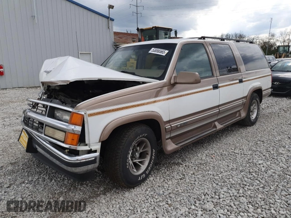 1999 Chevrolet Suburban with VIN 3GNEC16R9XG143471, listed as a Copart auction lot 53856565 with 208,621 mi miles and Salvage title. Bid and sale history available at DreamBid. Image 1.