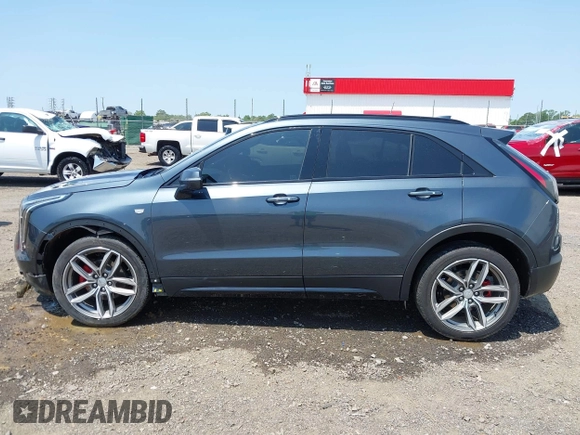 2021 Cadillac XT4 FWD Sport with VIN 1GYFZER41MF079193, listed as a IAAI auction lot 42331594 with 72,287 mi miles and . Bid and sale history available at DreamBid. Image 15.