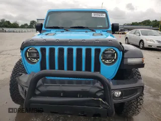 2021 Jeep Wrangler Unlimited Rubicon with VIN 1C4JJXFM4MW617635, listed as a Copart auction lot 58956205 with 52,995 mi miles and Salvage title. Bid and sale history available at DreamBid. Image 5.