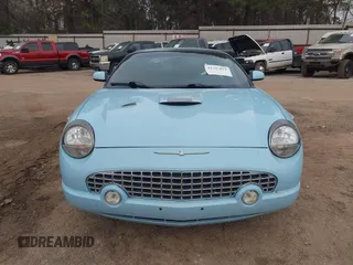 2003 Ford Thunderbird Deluxe z VIN 1FAHP60A53Y101461, wystawiony jako IAAI lot #41797831 z przebiegiem 64 760 mil mil oraz . Historia ofert i sprzedaży dostępna na DreamBid. Obrazek 13.