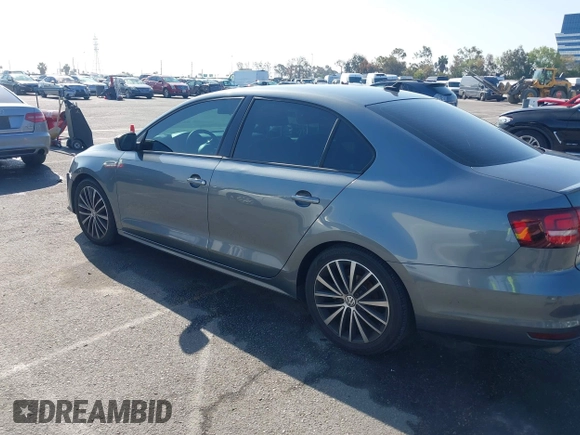 2016 Volkswagen Jetta Sport z VIN 3VWD17AJ5GM231530, wystawiony jako IAAI lot #41968152 z przebiegiem 85 474 mil mil oraz . Historia ofert i sprzedaży dostępna na DreamBid. Obrazek 14.