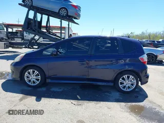 2009 Honda Fit Sport with VIN JHMGE88479S007307, listed as a IAAI auction lot 41801827 with 212,998 mi miles. Bid and sale history available at carsss.com. Image 14.