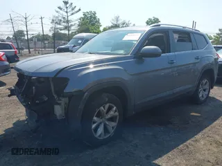 2018 Volkswagen Atlas SE with VIN 1V2KR2CA3JC504717, listed as a IAAI auction lot 42414174 with 105,909 mi miles and . Bid and sale history available at DreamBid. Image 2.