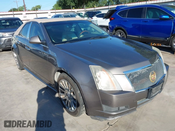 2012 Cadillac CTS Luxury z VIN 1G6DF5E58C0142041, wystawiony jako IAAI lot #42235864 z przebiegiem 59 697 mil mil oraz . Historia ofert i sprzedaży dostępna na DreamBid. Obrazek 1.