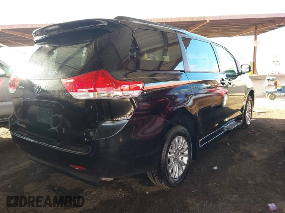 2012 Toyota Sienna XLE AAS with VIN 5TDYK3DC6CS263128, listed as a IAAI auction lot 41583798 with 114,820 mi miles. Bid and sale history available at carsss.com. Image 4.