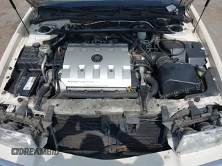 2002 Cadillac Eldorado ESC z VIN 1G6EL12Y92B100484, wystawiony jako IAAI lot #42418094 z przebiegiem 167 293 mil mil oraz . Historia ofert i sprzedaży dostępna na DreamBid. Obrazek 10.