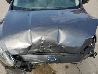 2015 Ford Focus SE z VIN 1FADP3F29FL340350, wystawiony jako Copart lot #53466455 z przebiegiem 146 374 mil mil oraz Szkoda całkowita • Salvage title. Historia ofert i sprzedaży dostępna na DreamBid. Obrazek 12.