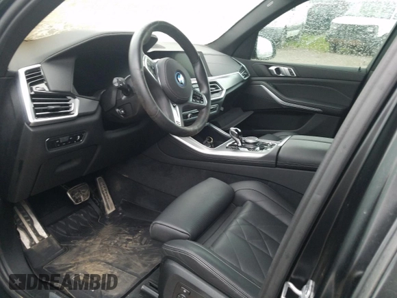 2023 BMW X5 xDrive45e z VIN 5UXTA6C05P9P88254, wystawiony jako Copart lot #56622044 z przebiegiem Nie podano mil oraz Nie do naprawy • Non repairable. Historia ofert i sprzedaży dostępna na DreamBid. Obrazek 7.