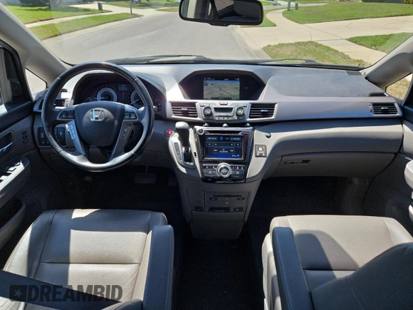 2017 Honda Odyssey Touring z VIN 5FNRL5H91HB008068, wystawiony jako Copart lot #49853805 z przebiegiem 33 521 mil mil oraz Czysty tytuł • Clean title. Historia ofert i sprzedaży dostępna na DreamBid. Obrazek 9.