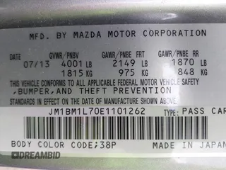 2014 Mazda 3 i Touring z VIN JM1BM1L70E1101262, wystawiony jako IAAI lot #42205168 z przebiegiem 152 069 mil mil oraz . Historia ofert i sprzedaży dostępna na DreamBid. Obrazek 9.