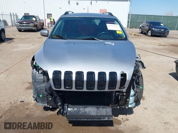 2016 Jeep Cherokee Latitude with VIN 1C4PJLCB2GW185637, listed as a IAAI auction lot 41894019 with 87,888 mi miles and . Bid and sale history available at DreamBid. Image 13.