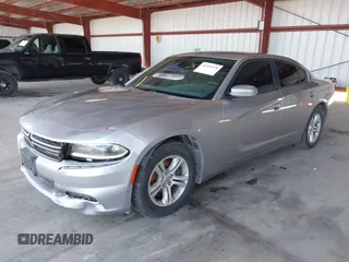 2015 Dodge Charger SE with VIN 2C3CDXBG1FH840060, listed as a IAAI auction lot 42111676 with 165,479 mi miles and . Bid and sale history available at carsss.com. Image 2.