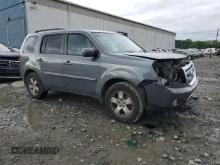 2011 Honda Pilot EX-L z VIN 5FNYF4H76BB095369, wystawiony jako Copart lot #57026435 z przebiegiem 128 443 mil mil oraz Szkoda całkowita • Salvage title. Historia ofert i sprzedaży dostępna na DreamBid. Obrazek 4.