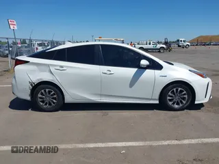 2019 Toyota Prius L Eco z VIN JTDKARFU5K3089070, wystawiony jako IAAI lot #42302536 z przebiegiem 122 911 mil mil oraz . Historia ofert i sprzedaży dostępna na DreamBid. Obrazek 13.