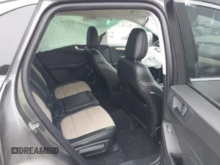 2021 Ford Escape Titanium with VIN 1FMCU9J92MUA27097, listed as a IAAI auction lot 41542774 with 14,822 mi miles and . Bid and sale history available at carsss.com. Image 8.