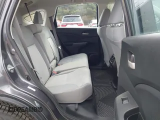 2015 Honda CR-V LX with VIN 5J6RM4H34FL031089, listed as a IAAI auction lot 42123159 with 74,566 mi miles and . Bid and sale history available at DreamBid. Image 8.