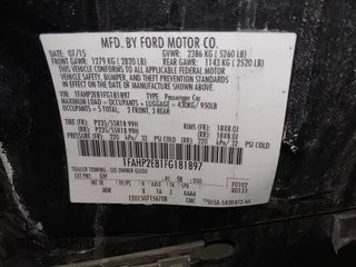 2015 Ford Taurus SEL with VIN 1FAHP2E81FG181897, listed as a IAAI auction lot 41598004 with Not Provided miles and . Bid and sale history available at carsss.com. Image 9.