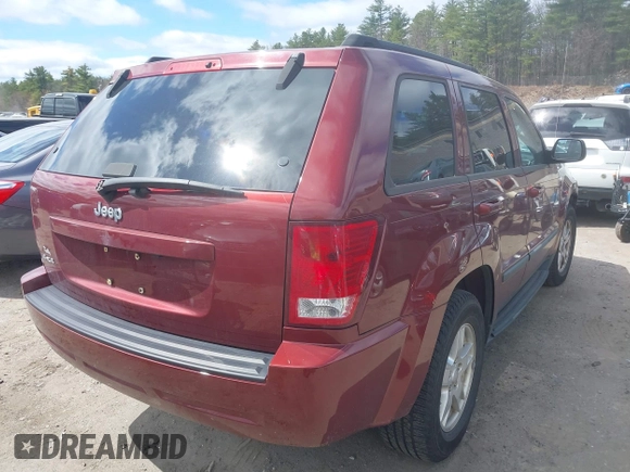 2007 Jeep Grand Cherokee Laredo with VIN 1J8GR48K27C518078, listed as a IAAI auction lot 42028460 with 121,530 mi miles. Bid and sale history available at carsss.com. Image 4.