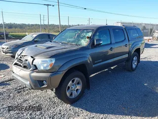 2015 Toyota Tacoma with VIN 5TFLU4EN9FX116262, listed as a IAAI auction lot 40515106 with 95,290 mi miles and . Bid and sale history available at DreamBid. Image 2.