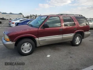 2000 GMC Jimmy SL with VIN 1GKCS13WXY2180539, listed as a Copart auction lot 89411665 with 167,674 mi miles and Salvage Title. Bid and sale history available at carsss.com. Image 1.