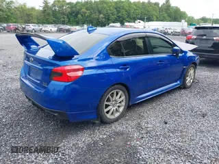 2017 Subaru WRX with VIN JF1VA1B66H9809817, listed as a IAAI auction lot 42427770 with 142,422 mi miles and . Bid and sale history available at DreamBid. Image 4.