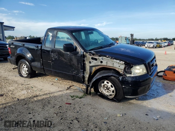 2007 Ford F-150 STX with VIN 1FTRF02297KD15057, listed as a Copart auction lot 73847974 with 184,413 mi miles and Salvage Title. Bid and sale history available at carsss.com. Image 4.