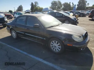 2002 Hyundai Sonata GLS with VIN KMHWF35H92A641858, listed as a Copart auction lot 80581244 with 124,020 mi miles and Clean Title. Bid and sale history available at carsss.com. Image 4.