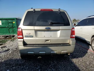 2010 Ford Escape XLT с VIN 1FMCU0D71AKA71198, выставлен на аукционе Copart как лот 48766805 с пробегом 243 732 миль миль и Списание • Salvage title. История ставок и продаж доступна на DreamBid. Изображение 6.