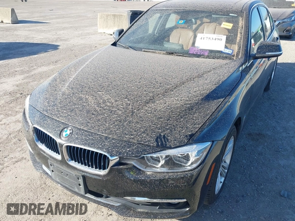 2017 BMW 3 Series 330e iPerformance with VIN WBA8E1C34HA156688, listed as a IAAI auction lot 41753490 with 74,130 mi miles. Bid and sale history available at carsss.com. Image 6.
