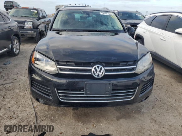 2012 Volkswagen Touareg Exec with VIN WVGEF9BP1CD011407, listed as a Copart auction lot 79199754 with 57,376 mi miles and Salvage Title. Bid and sale history available at DreamBid. Image 5.