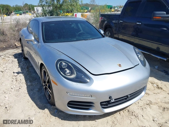 2014 Porsche Panamera S E-Hybrid with VIN WP0AD2A75EL044663, listed as a IAAI auction lot 41818381 with 44,194 mi miles. Bid and sale history available at carsss.com. Image 1.