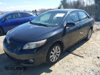 2009 Toyota Corolla with VIN JTDBL40EX9J048373, listed as a IAAI auction lot 41890789 with 191,490 mi miles. Bid and sale history available at carsss.com. Image 2.