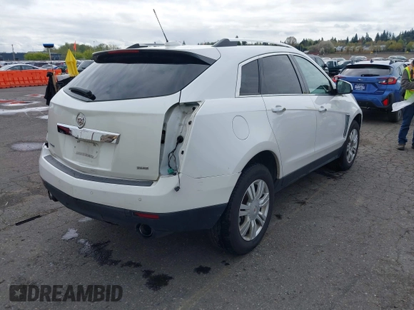 2016 Cadillac SRX Luxury Collection z VIN 3GYFNBE33GS507014, wystawiony jako IAAI lot #41979980 z przebiegiem 115 077 mil mil oraz . Historia ofert i sprzedaży dostępna na DreamBid. Obrazek 4.