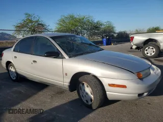 2000 Saturn SL with VIN 1G8ZH5281YZ242734, listed as a Copart auction lot 57433915 with Not provided miles and Salvage title. Bid and sale history available at DreamBid. Image 4.