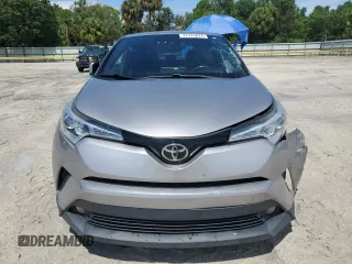2018 Toyota C-HR XLE with VIN NMTKHMBX7JR021704, listed as a Copart auction lot 71171874 with 82,872 mi miles and Salvage Title. Bid and sale history available at DreamBid. Image 5.