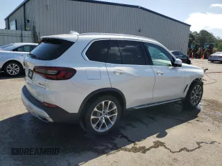 2021 BMW X5 xDrive40i z VIN 5UXCR6C0XM9E49285, wystawiony jako Copart lot #60897325 z przebiegiem 57 314 mil mil oraz Szkoda całkowita • Salvage title. Historia ofert i sprzedaży dostępna na DreamBid. Obrazek 3.